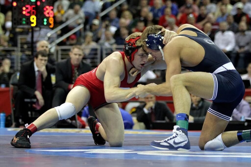 Kyle Dake wearing Cliff Keen headgear during a match